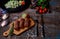 Products grill: steak, sausage and vegetable on a rustic wooden table. Sausages on the grill pan on the wooden background. Horizon