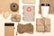 Products made from recycled kraft paperand wood: packages,  notebook, disposable coffee cup, wooden heart, cord. concept of