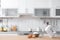 Products, mixer and blurred view of kitchen interior