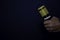 Profesional Microphone on hands isolated black background. Podcast Concept