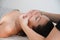 Professional anti-aging facial massage. Relaxing facial treatment at spa. Face massage concept