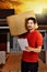 Professional asian male courier deliver the package
