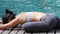 Professional asian woman practice yoga sequence Sleeping Pigeon Pose