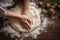 Professional baker hands kneading dough while preparing bread loaves. Woman hands preparing bread loaf while cooking homemade in