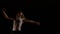 Professional ballerina dancer spinning and dancing with graceful moves in slow motion