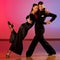 Professional ballroom dance couple preform an exhibition dance