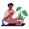 Professional barista making drip, filter coffee in pour over, chemex. Worker in apron preparing beverage in cafe. Black