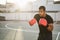 Professional boxer training outdoor in city park - Soft focus on left glove