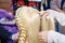 Professional braiding of braids by a master hairdresser in a beauty salon.