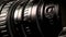 Professional camcorder lens on dark background, macro