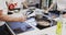 Professional Caucasian male chef in a restaurant kitchen preparing shrimps using a frying pan