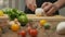 Professional chef cuts white onion. Slow motion.