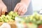 Professional Chef Hands Chopping Exotic Avocado