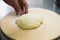 Professional chef prepares a closed meat pie