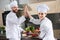 Professional chefs giving high five