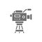 Professional cinema camera with microphone grey icon.