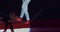 Professional circus performer is walking on a tightrope, balancing skill, 4k