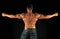 Professional coach demonstrate achievements. Exercises for back. Bodybuilder perfect shape rear view. Strong bodybuilder