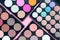 Professional colorful eyeshadow palette. Many multicolor trending shades. Beauty salon. Spring trends in makeup.