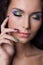 Professional colourful make-up and manicure