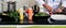 Professional cook cutting ingredients and preparing a white plate for a delicious meal