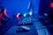 Professional cyber video gamer studio room with personal computer armchair, keyboard for stream in neon color blur