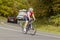 A professional cyclist mountain biker wearing cycling tights and helmet is riding bike on Skyline drive,