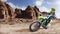 Professional dirt bike rider racing on the desert