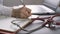 Professional doctor working on laptop in lab, stethoscope on table, medicine