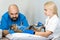 Professional doctors veterinarians perform ultrasound examination of the internal organs of a cat in a veterinary clinic