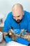 Professional doctors veterinarians perform ultrasound examination of the internal organs of a cat in a veterinary clinic