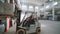 Professional Driver Operates Forklift Truck With Cargo In Big Warehouse.