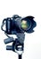 Professional DSLR camera with telephoto zoom lens on tripod