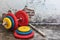 Professional dumbbells and multi-colored weight plates on a vintage background. Sports equipment. Healthy lifestyle