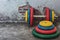 Professional dumbbells and multi-colored weight plates on a vintage background. Sports equipment. Healthy lifestyle