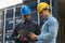 Professional engineer and businessman checking and inspect containers in international cargo at the logistic port.  industrial,