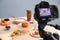 Professional equipment and composition with delicious dessert on beige table in studio. Food photography
