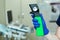 Professional equipment ophthalmologist tonometer..Doctor vet holds in his hand with a glove veterinary tonometer..Blurred