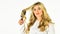 Professional equipment. Pretty woman brushing hair isolated on white. Long hair. Hair care. Hairdresser salon. Easy