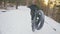 Professional extreme sportsman biker riding fat bike in outdoor. Cyclist ride in winter snow forest. Man does trial