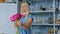 Professional floral artist sorting flowers at studio