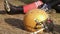 Professional football player sitting on pitch during time-out, helmet closeup