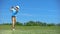 Professional golf player hitting swing shot at course, training before game