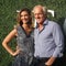 Professional golfer and entrepreneur Greg Norman and Kirsten Kutner on the blue carpet before US Open 2017 opening night ceremony