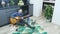 Professional guitarist playing rock drive music on acoustic guitar at home in kitchen. Man musician play acoustic guitar, relaxing