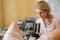 Professional gynecologist examining her female patient on a gynecological chair