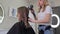 Professional hair drying technique, the master dries the hair of the client\'s