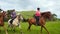 Professional horse riders riding horses slow motion. Equestrians dp equitation