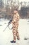 Professional hunter looking for prey during winter season. War, hunting or protection concept