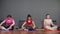 Professional lady yoga practitioners sit in lotus poses
